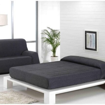 Cubre sofá Multiusos jarapas Composición del tejido: 80% Algodón, 20% Poliéster Fabricado en España Tonos Negro.