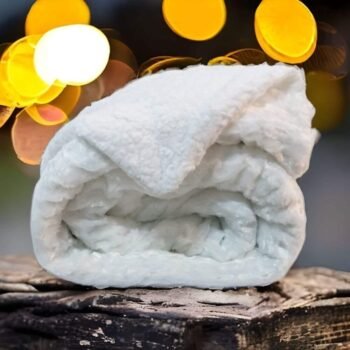 Manta para Sofá y Cama Sherpa con Visón en Blanca: Calidez, Comodidad y Estilo Decorativo.