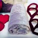 Manta para Sofá y Cama Sherpa con Visón en Lila: Calidez, Comodidad y Estilo Decorativo.
